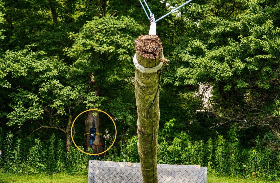 Setting a 30ft utility pole where heavy  equipment can’t go.